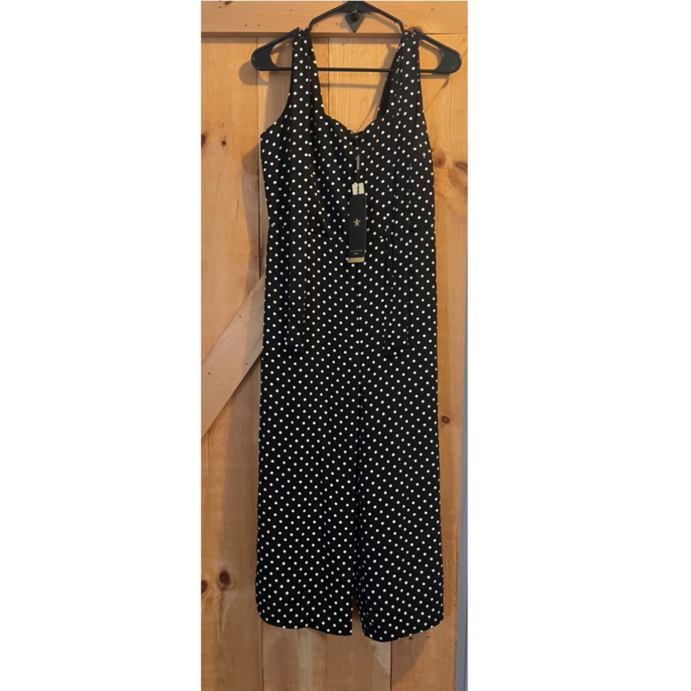 Brand new Polka dot wide legged romper.